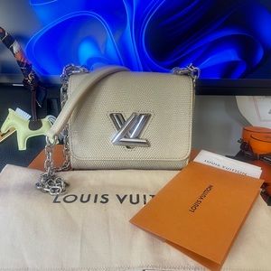 BNIB Louis Vuitton Twist Mini Lezard limited edition.  Full Set w/receipt.